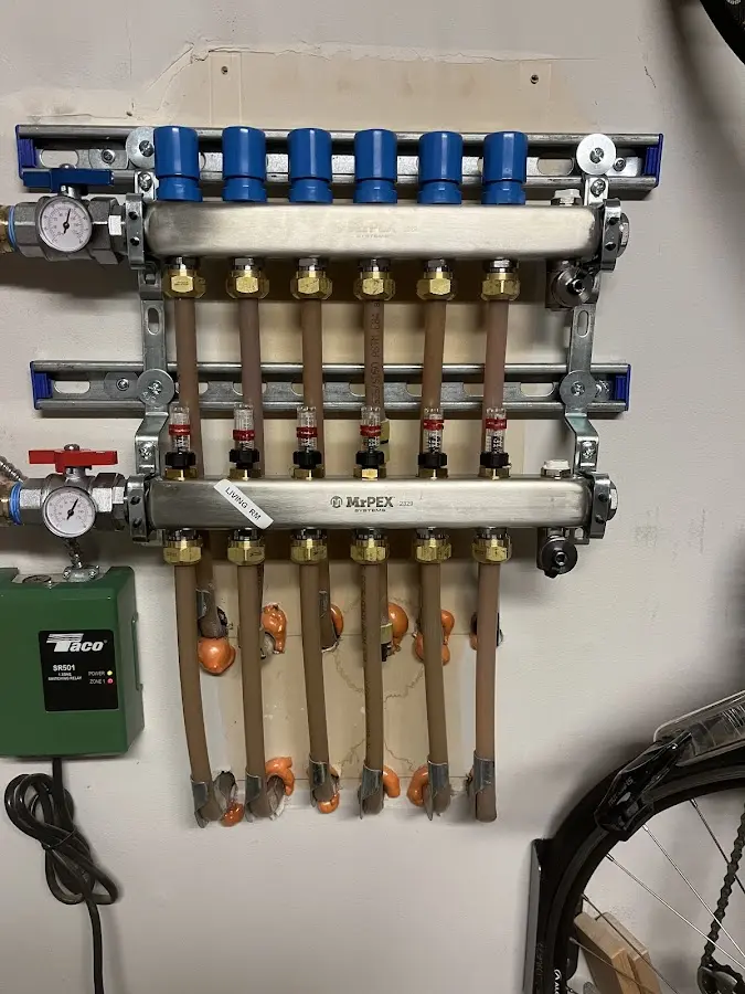 Plumber performing Leak Detection at a residential property in Deerfield